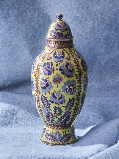 Vintage handpainted ceramic jar with lid in acid green with blue floral design