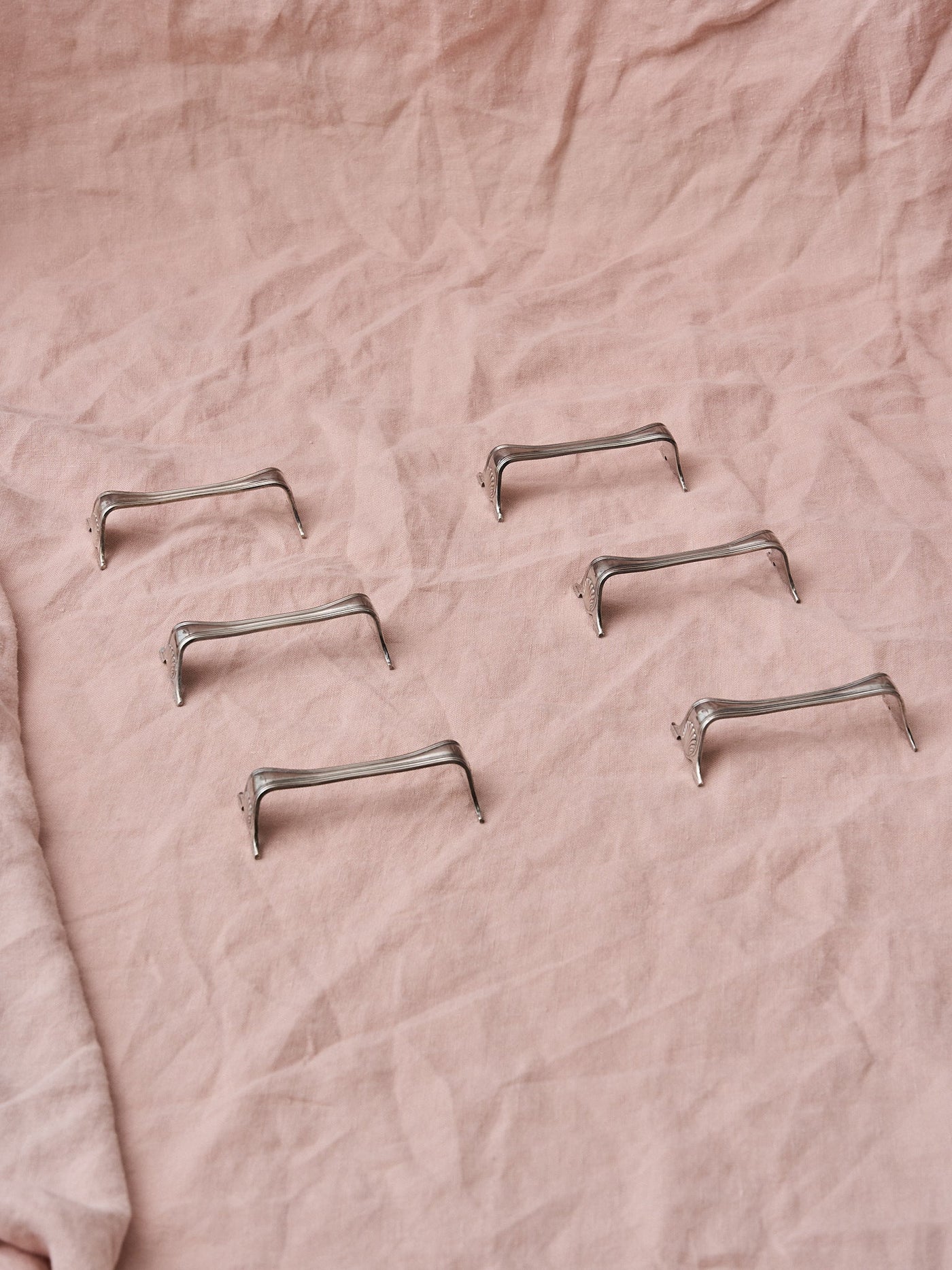 Set of six vintage silver Ecruis cutlery rests from France.